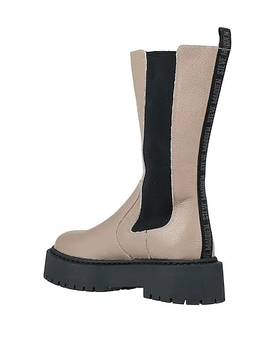 https://images.styletyx.com/images/light-brown-leather-boots-steve-madden-2730431_3.webp