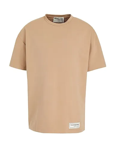 https://images.styletyx.com/images/light-brown-synthetic-fabric-t-shirt-the-giving-movement-x-yoox-606849_1.webp