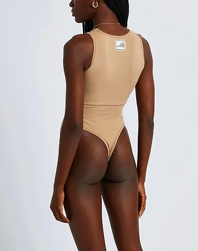 https://images.styletyx.com/images/light-brown-synthetic-fabric-top-the-giving-movement-x-yoox-235987_3.webp