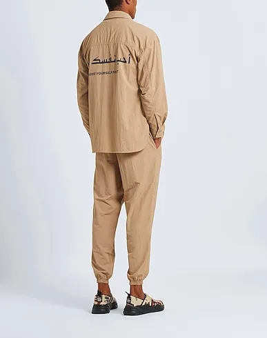 https://images.styletyx.com/images/light-brown-techno-fabric-the-giving-movement-x-yoox-2059827_3.webp