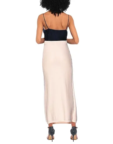 https://images.styletyx.com/images/light-pink-knitted-maxi-skirts-raf-simons-1079782_3.webp