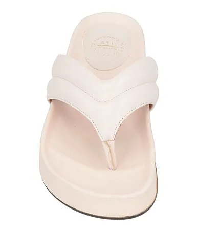 https://images.styletyx.com/images/light-pink-leather-flip-flops-atp-atelier-1003870390_4.webp