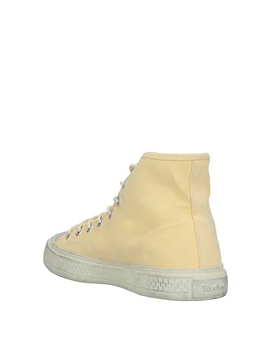 https://images.styletyx.com/images/light-yellow-canvas-sneakers-acne-studios-3074204_3.webp