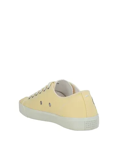 https://images.styletyx.com/images/light-yellow-canvas-sneakers-maison-margiela-13338349_3.webp