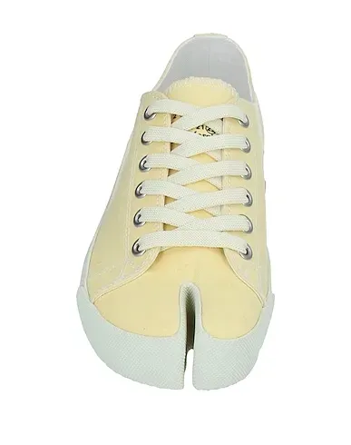 https://images.styletyx.com/images/light-yellow-canvas-sneakers-maison-margiela-13338349_4.webp