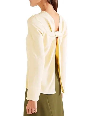https://images.styletyx.com/images/light-yellow-crepe-blouse-victoria-beckham-13235277_3.webp