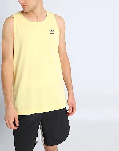 https://images.styletyx.com/images/light-yellow-jersey-t-shirt-trefoil-essentials-tank-top-adidas-13328636_2.webp