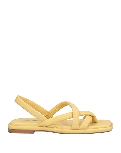 https://images.styletyx.com/images/light-yellow-leather-flip-flops-181-13016454_1.webp