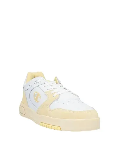 https://images.styletyx.com/images/light-yellow-leather-sneakers-champion-3202641_2.webp