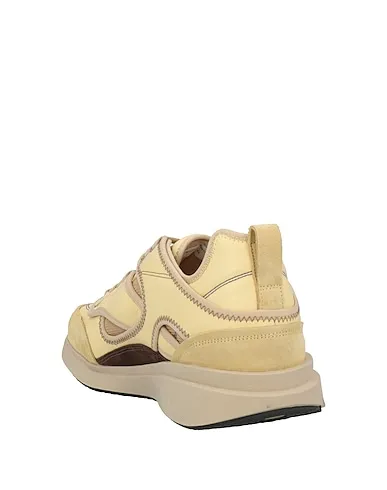 https://images.styletyx.com/images/light-yellow-leather-sneakers-oamc-13329527_3.webp