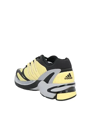 https://images.styletyx.com/images/light-yellow-plain-weave-sneakers-adidas-1225021337_3.webp