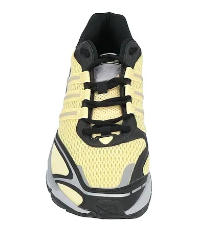 https://images.styletyx.com/images/light-yellow-plain-weave-sneakers-adidas-1225021337_4.webp