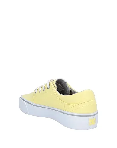 https://images.styletyx.com/images/light-yellow-plain-weave-sneakers-dc-1265442_3.webp