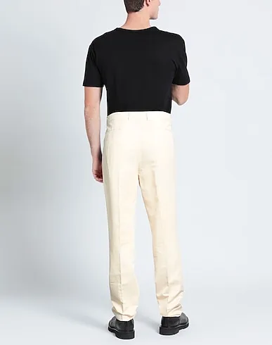 https://images.styletyx.com/images/light-yellow-silk-shantung-casual-pants-brunello-cucinelli-839068230_3.webp