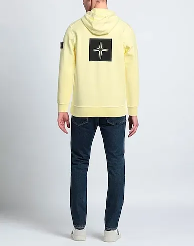 https://images.styletyx.com/images/light-yellow-sweatshirt-hooded-sweatshirt-stone-island-1717240168_3.webp