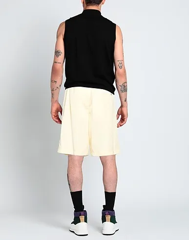 https://images.styletyx.com/images/light-yellow-techno-fabric-shorts-bermuda-jil-sander-997196007_3.webp