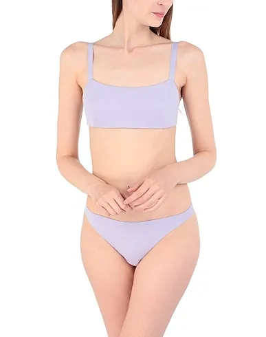 https://images.styletyx.com/images/lilac-jersey-thongs-the-nude-label-2956827_4.webp