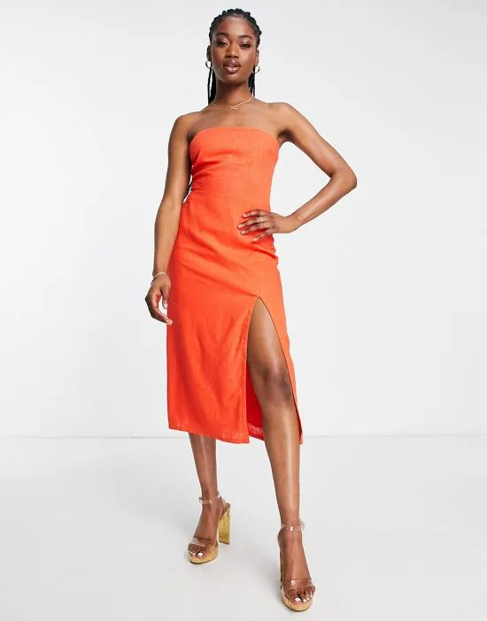 https://images.styletyx.com/images/linen-midi-dress-with-thigh-split-in-tangerine-sndys-1803179_1.webp