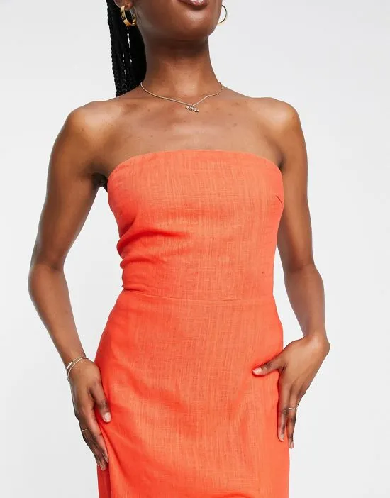 https://images.styletyx.com/images/linen-midi-dress-with-thigh-split-in-tangerine-sndys-1803179_4.webp