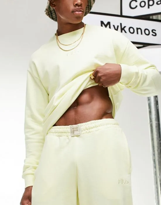 https://images.styletyx.com/images/logo-sweatpants-in-yellow-exclusive-to-asos-fila-3297092_3.webp