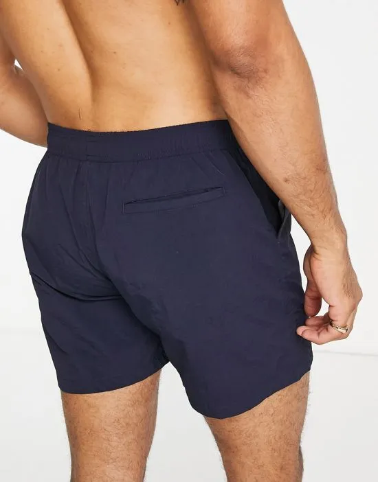 https://images.styletyx.com/images/logo-swim-shorts-in-blue-barbour-beacon-13096043_3.webp