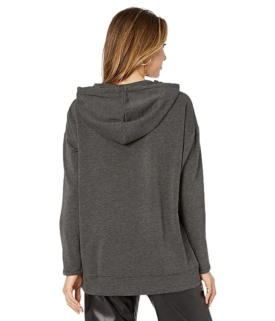 https://images.styletyx.com/images/long-sleeve-mix-media-hoodie-pullover-h-halston-3036421_2.webp