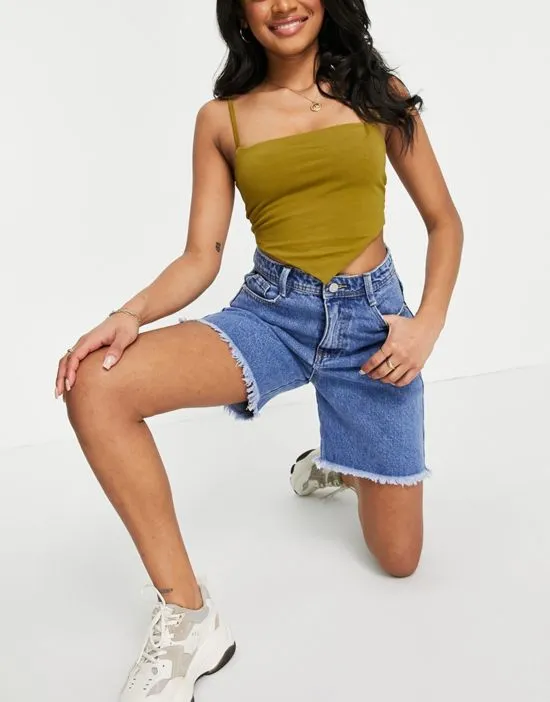 https://images.styletyx.com/images/longline-denim-shorts-in-blue-missguided-petite-1865626_4.webp