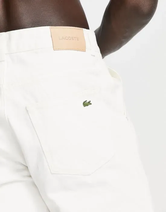https://images.styletyx.com/images/loose-fit-five-pocket-denim-jeans-in-white-lacoste-13494381_4.webp