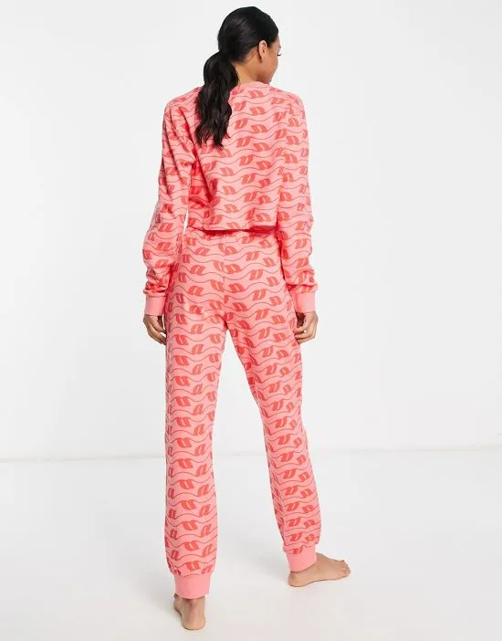 https://images.styletyx.com/images/lounge-monogram-print-sweatshirt-sweatpants-set-in-pink-red-asos-design-2568822_2.webp