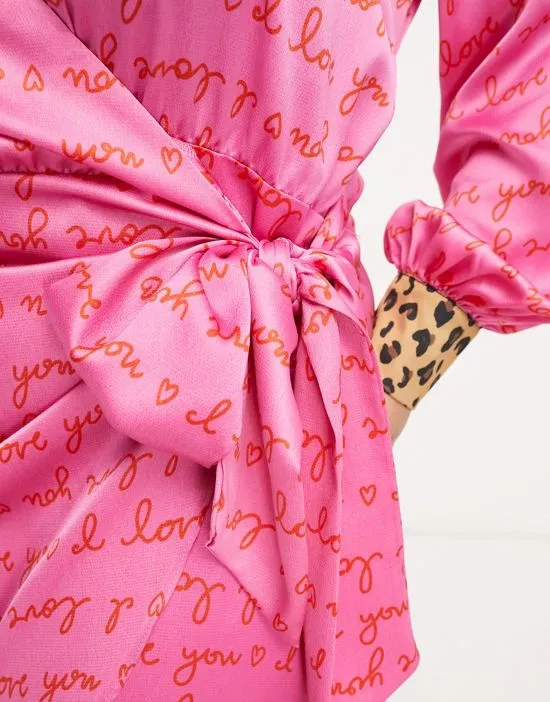 https://images.styletyx.com/images/love-print-wrap-mini-dress-in-pink-and-red-never-fully-dressed-plus-1003661807_4.webp