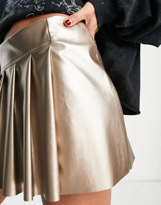 https://images.styletyx.com/images/low-rise-faux-leather-pleated-mini-skirt-in-metallic-asos-design-13027358_3.webp
