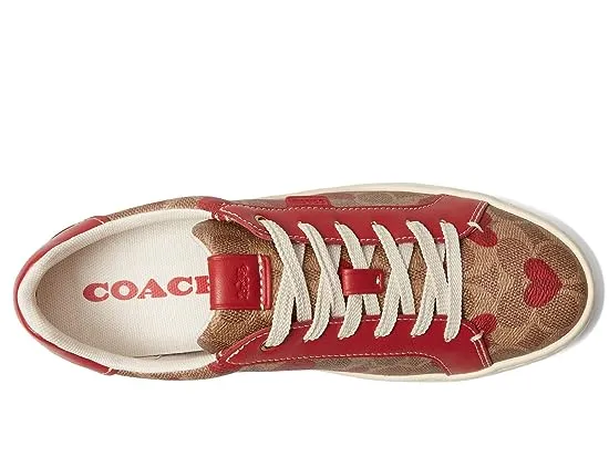 https://images.styletyx.com/images/lowline-coated-canvas-coach-12949733_2.webp