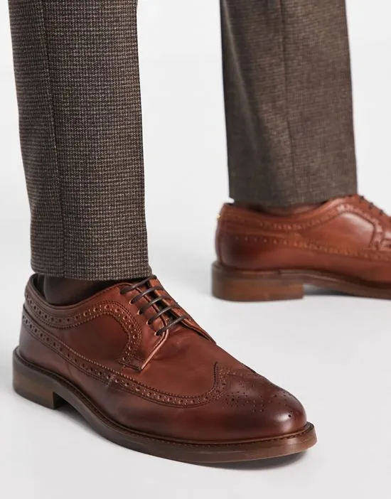 https://images.styletyx.com/images/made-in-portugal-brogue-shoes-with-chunky-sole-in-brown-leather-noak-2568064_1.webp