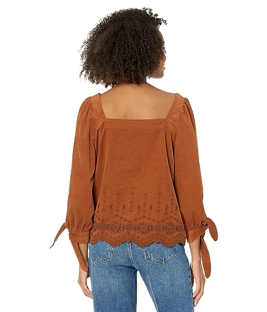 https://images.styletyx.com/images/madewell-embroidered-eyelet-corduroy-tie-sleeve-top-madewell-2407106_2.webp