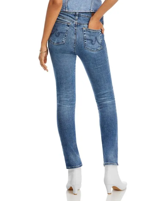 https://images.styletyx.com/images/mari-high-rise-slim-straight-jeans-in-15-years-shoreline-ag-2431168_3.webp