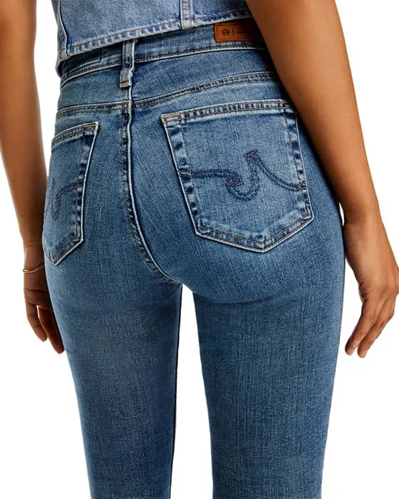https://images.styletyx.com/images/mari-high-rise-slim-straight-jeans-in-15-years-shoreline-ag-2431168_5.webp
