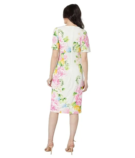 https://images.styletyx.com/images/matte-jersey-floral-dress-with-sheer-overlay-maggy-london-873615934_2.webp