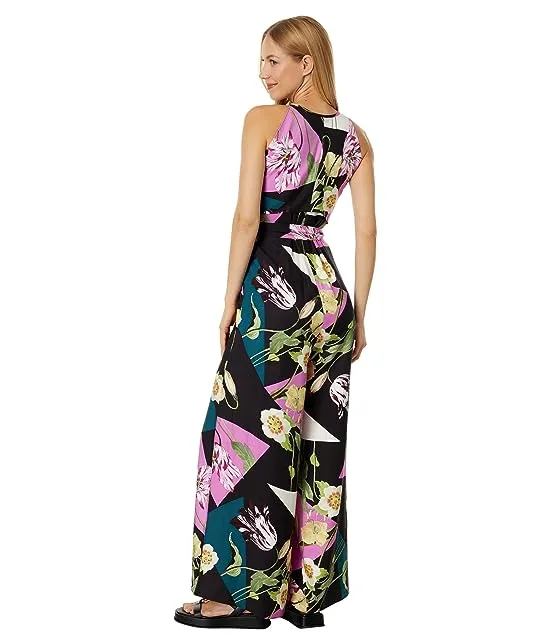 https://images.styletyx.com/images/maudee-printed-halter-neck-jumpsuit-ted-baker-13426951_2.webp