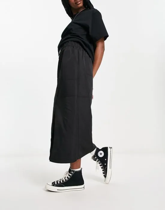 https://images.styletyx.com/images/maxi-cargo-skirt-with-belt-detail-in-techy-fabric-in-black-asos-design-13099364_4.webp