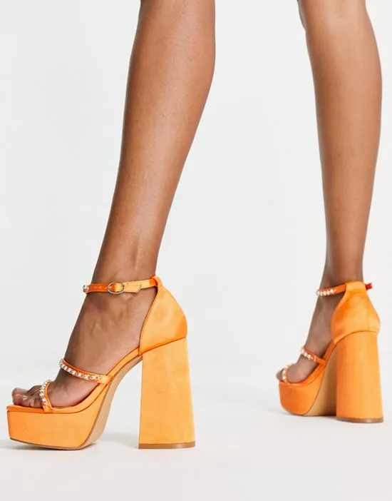 https://images.styletyx.com/images/mega-platform-embellished-heeled-sandals-in-orange-satin-london-rebel-2768988_2.webp