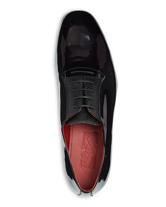 https://images.styletyx.com/images/men-s-gianbattis-plain-toe-oxfords-ferragamo-13264377_2.webp