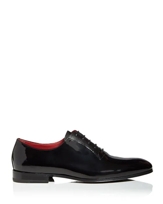 https://images.styletyx.com/images/men-s-gianbattis-plain-toe-oxfords-ferragamo-13264377_4.webp