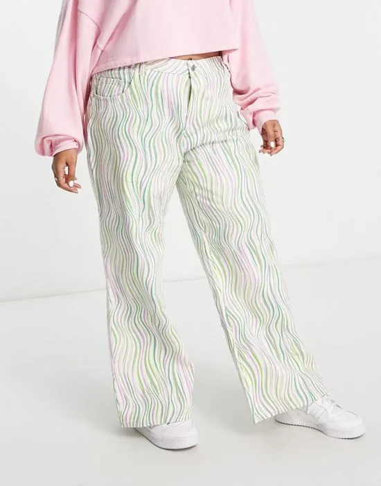https://images.styletyx.com/images/mid-rise-a-line-printed-jeans-in-purple-and-green-wave-print-noisy-may-curve-13285846_4.webp