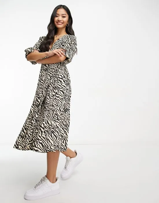https://images.styletyx.com/images/midi-wrap-dress-in-cream-and-black-zebra-wednesday-s-girl-13140291_2.webp