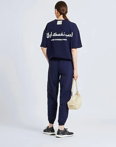 https://images.styletyx.com/images/midnight-blue-techno-fabric-casual-pants-the-giving-movement-x-yoox-2954788_5.webp