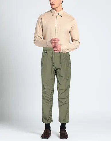 https://images.styletyx.com/images/military-green-techno-fabric-casual-pants-maharishi-13136862_2.webp