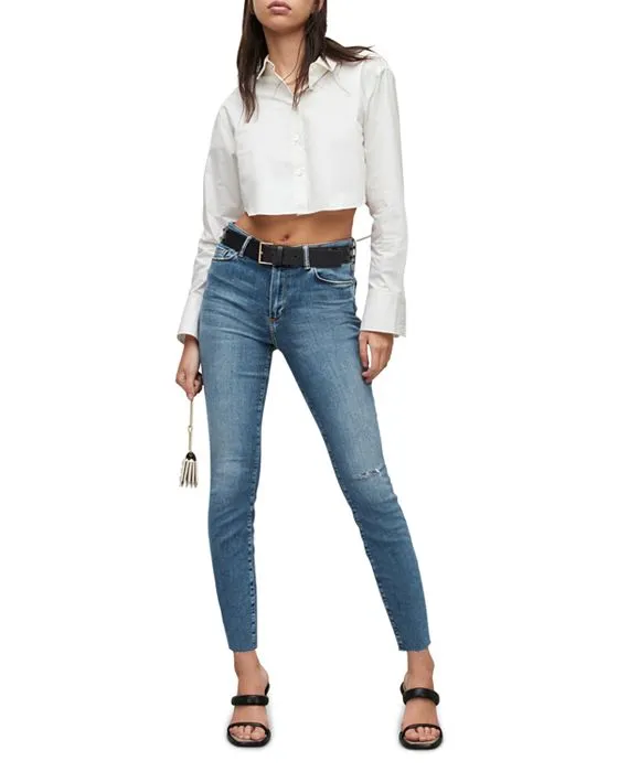 https://images.styletyx.com/images/miller-destroyed-high-rise-ankle-skinny-jeans-in-indigo-blue-allsaints-13252480_2.webp
