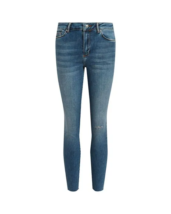 https://images.styletyx.com/images/miller-destroyed-high-rise-ankle-skinny-jeans-in-indigo-blue-allsaints-13252480_5.webp