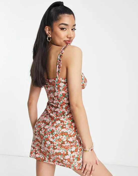 https://images.styletyx.com/images/mini-cami-dress-with-frill-straps-in-pink-floral-wednesday-s-girl-1819590_2.webp