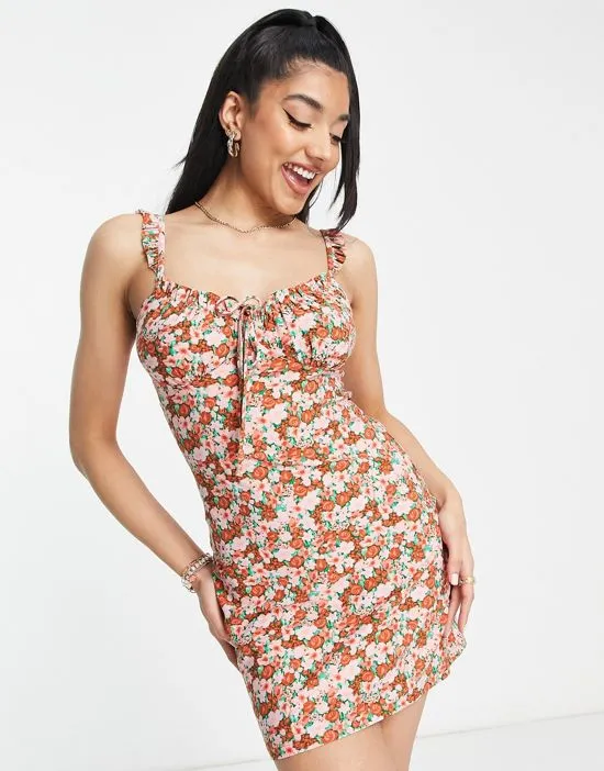 https://images.styletyx.com/images/mini-cami-dress-with-frill-straps-in-pink-floral-wednesday-s-girl-1819590_4.webp